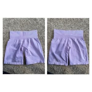 Purple NVGTN medium shorts.